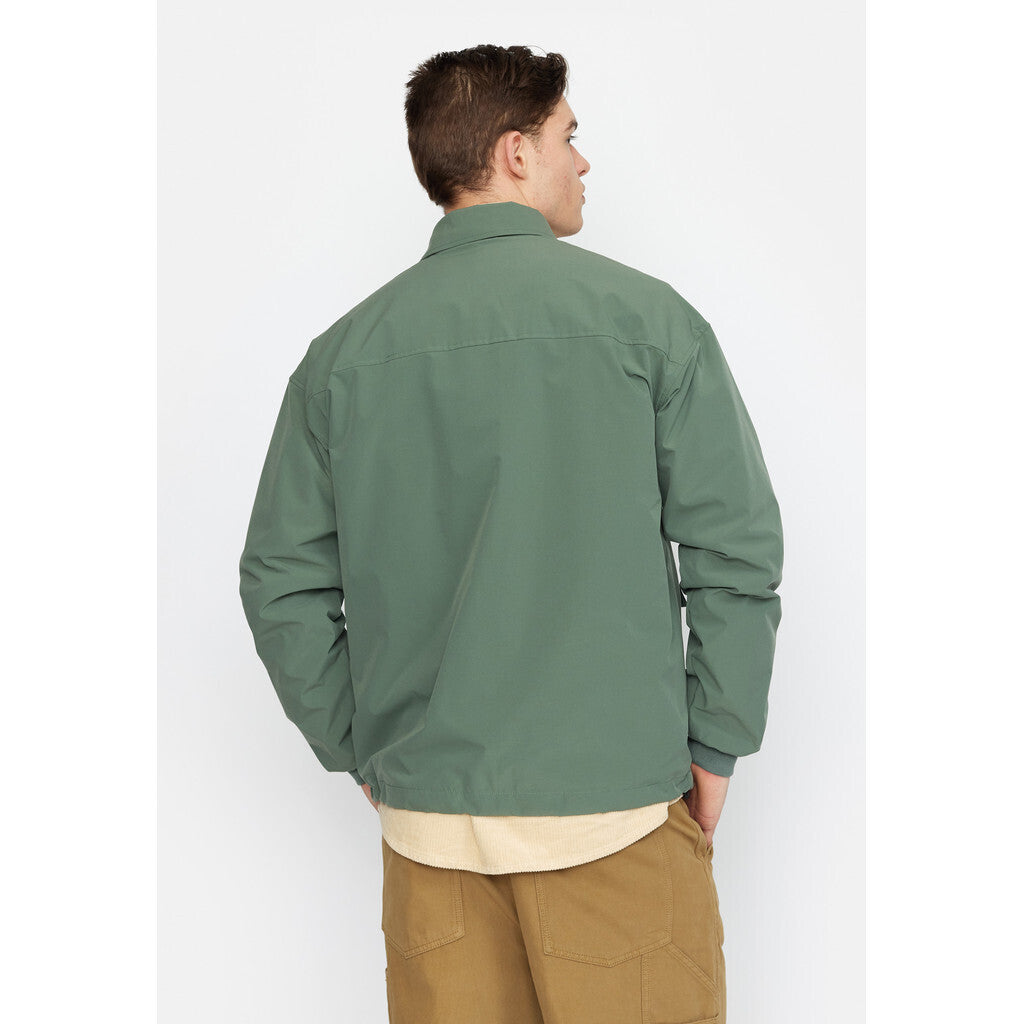 Essential Green Coach Jacket: A Trendy Addition to Your Wardrobe